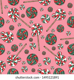 Christmas vector seamless pattern with candy lollipops. Endless texture for design of packaging, fabric, print, textile.