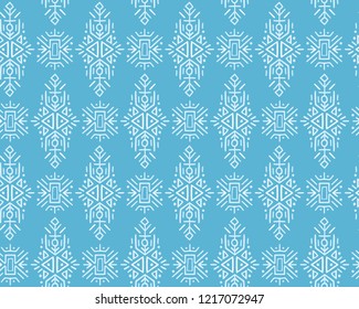 Christmas Vector Seamless Pattern in Ethnic Style. Creative tribal endless ornament, perfect for textile design, wrapping paper, wallpaper or site background. Trendy hand drawn boho tile.