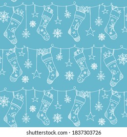 Christmas vector seamless pattern with Christmas socks and gifts. Design for wrapping paper, sites, banners.