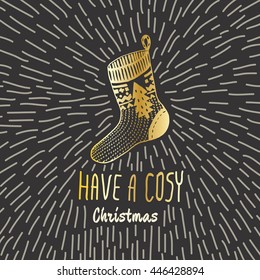 Christmas vintage card with with hand drawn knitted sock and text 'Have a Cosy Christmas'. Vector hand drawn illustration on blue background.