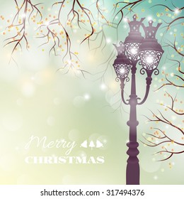 Christmas vintage card with street lamp on defocused background