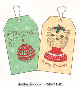 Christmas vintage tags. Hand drawn Yorkshire terrier dressed up in sweater. Vector illustration.