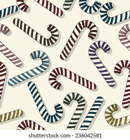 Christmas wallpaper seamless pattern with colored doodle candy canes