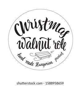 Christmas walnut roll, hand made Hungarian product. Hand writing modern calygraphy text isolated on white background.