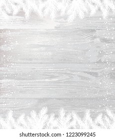 Christmas white wooden background with winter fir branches with snowflakes, light. Xmas and New Year card. Vector Illustration