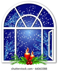 Christmas window with candles and snow