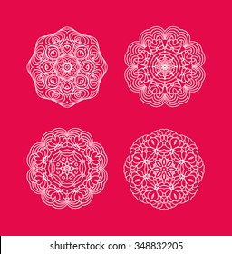 Christmas winter background. White snowflakes on red background