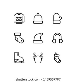 Christmas winter clothes line icons. Vector Set