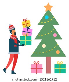 Christmas and winter holidays celebration vector, isolated pine tree and male carrying gifts. Father hiding presents for family under spruce decorated with baubles and garlands. Flat style xmas