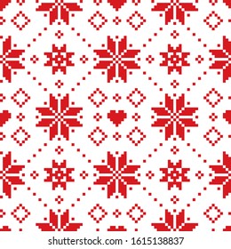 Christmas or winter Scottish Fair Isle style traditional knitwear vector seamless pattern with red snoflakes on white background. Retro Xmas textile folk art design inspired by traditional patterns 