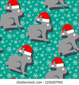 Christmas, winter seamless pattern with cute rabbit in Santa Claus hat and snowflakes.