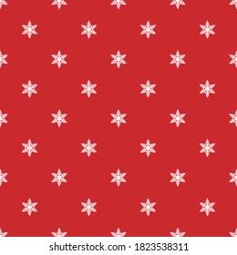 Christmas winter white snowflake seamless pattern on red background for holiday wrapper paper or xmas card in retro, vintage design. Cute  illustration for festive decor