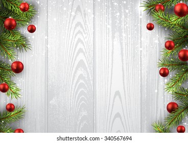 Christmas wooden background with fir branches and balls. Vector illustration.