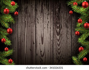 Christmas wooden background with fir branches and balls. Vector illustration.