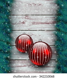 Christmas wooden background with fir branches and balls. Vector illustration. 