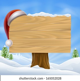 A Christmas wooden sign with a Santa Hat hanging on it in a snowy winter landscape