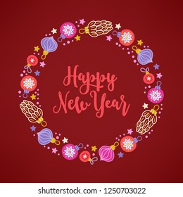 Christmas wreath with balls, baubles, stars, cones and confetti on bordo background. Perfect for holiday greeting cards