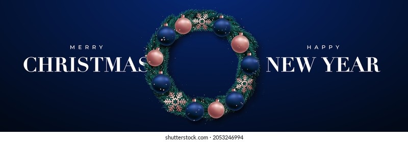 Christmas Wreath banner. Xmas wreath made of naturalistic looking pine branches decorated with blue and rose gold baubles, snowflakes.