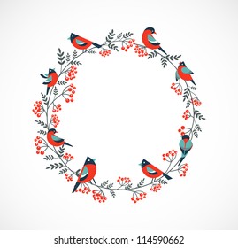 Christmas wreath with birds and ashberry