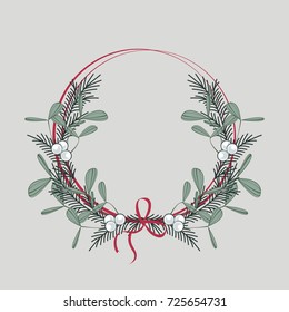 Christmas wreath with branches and mistletoe
