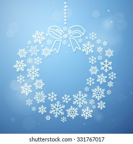 Christmas wreath consisting of a scattering shining snowflakes