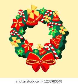 Christmas wreath decorated with bells, stars, candies and bow. Beautiful Christmas wreath on a yellow background with a large bright bow.