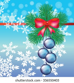 Christmas wreath of fir branches in the shape of a star with a red bow and streamers
and a bunch of hanging blue Christmas balls on a blue background with swirl of white snowflakes