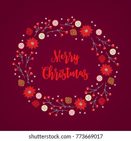 Christmas wreath with flowers, berries, snowflakes, balls and cones on dark background. Perfect for holiday greeting cards