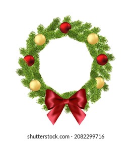 Christmas wreath from fluffy green pine tree branches with christmas balls