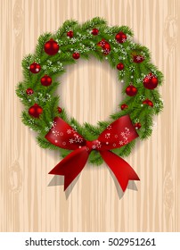 Christmas wreath. Green branch of fir with red balls and ribbon on a background of wood. Christmas decorations on the door. Vector illustration