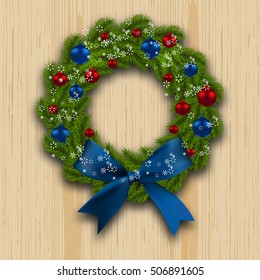 Christmas wreath. Green branch of fir with red, blue balls and blue bow on wood background. Christmas cards. Vector illustration