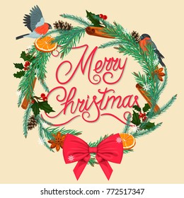 Christmas wreath made of pine needles with spices, bow and cute birds. Merry Christmas hand written writing