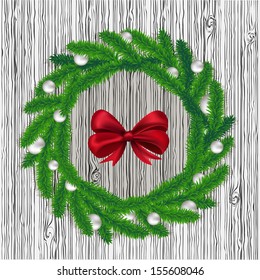 Christmas wreath on gray background, vector