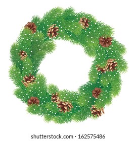 Christmas wreath of pine branches with cones and snow