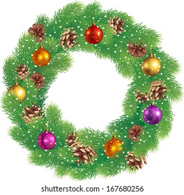 Christmas wreath of pine branches with cones, balls and snow