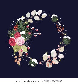 Christmas wreath of roses, spruce twigs, berries and leaves sprinkled with snow on a dark blue background