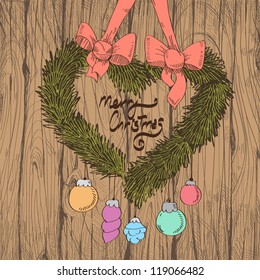 Christmas wreath in the shape of heart