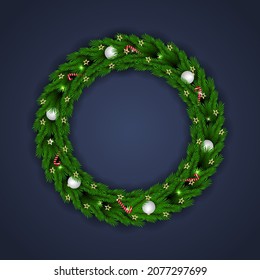 Christmas wreath white balls golden stars and candy with green leaf