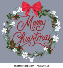 Christmas wreath with white flowers and a red bow