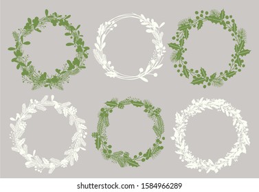 Christmas wreaths silhouettes vector illustrations set. Stylish white and green frames isolated on grey background. Empty ilex and fir twigs round borders with text space. Decorative Xmas elements.