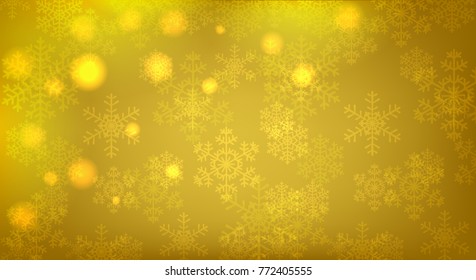 Christmas yellow background with glowing snowflakes and bokeh