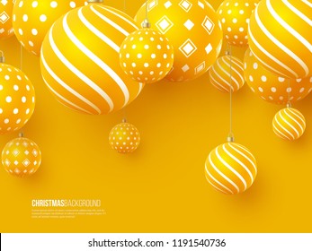 Christmas yellow balls with geometric pattern. 3d realistic style, abstract holiday background. Vector illustration.