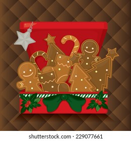 Christmas's Gingerbread in red box with green ribbon and Christmas ornament.