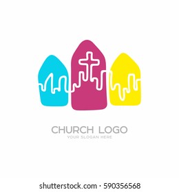 Church logo. Christian symbols. The city and the cross of Jesus Christ on the color elements.