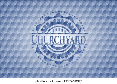 Churchyard blue emblem with geometric pattern background.