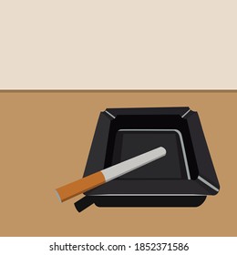 cigarette and ashtray on the brown board