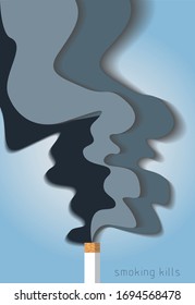 cigarette smoke on ble background with message letters of smoking kills