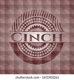 Emblema rojo cinche sin fisuras con un patrón geométrico.