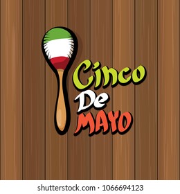 Cinco de Mayo banner with hand drawn calligraphy lettering. Mexican fiests holiday vector background. Cinco de Mayo calligraphic greeting card or poster on wooden background