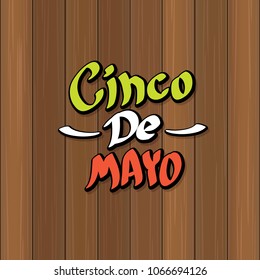 Cinco de Mayo banner with hand drawn calligraphy lettering. Mexican fiests holiday vector background. Cinco de Mayo calligraphic greeting card or poster on wooden background